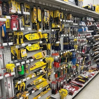 Workshop supplies aisle with sealants, lubricants and Tub O'Towels